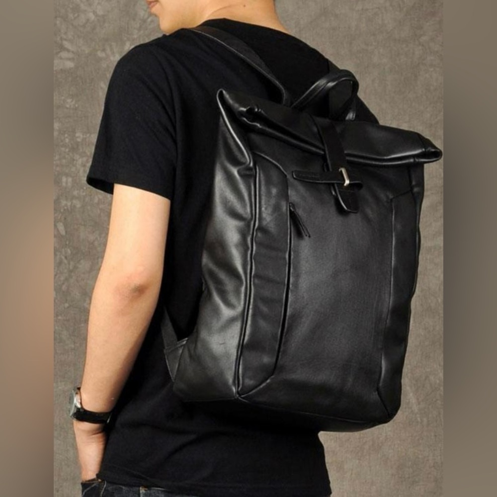 Black leather men’s backpack. In very good condition.